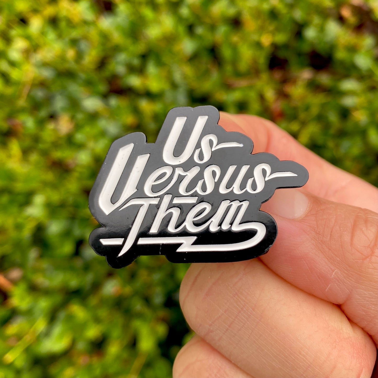 Us Versus Them Enamel Pin