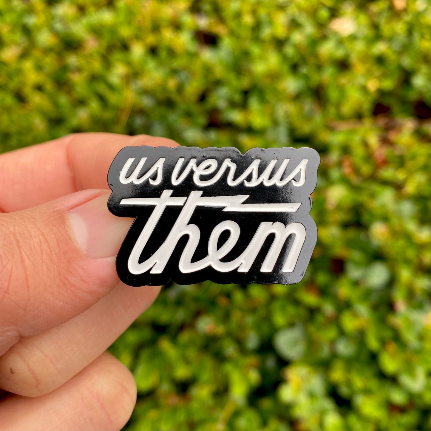 Us Versus Them Enamel Pin