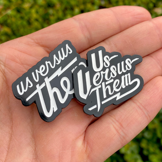 Us Versus Them Enamel Pin